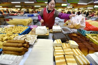 浙江仙居春節(jié)市場貨源充足品種豐富 食用農(nóng)產(chǎn)品批發(fā)交易活躍